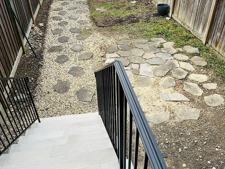 Backyard has additional storage unit, leads to a park, and has brand new concrete stairs! Hardscape for minimal maintenance!
