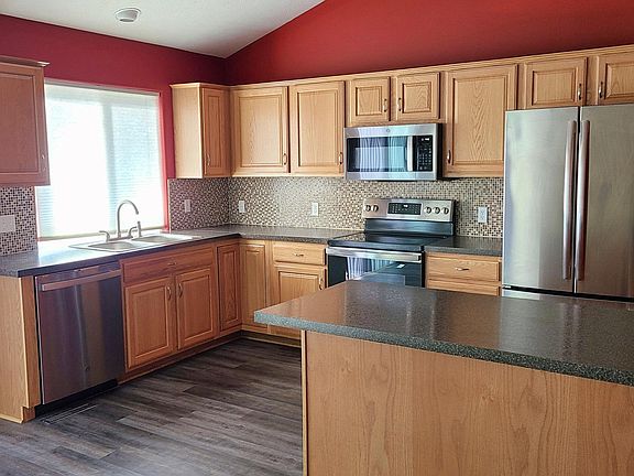 Kitchen includes new stainless appliances and sink