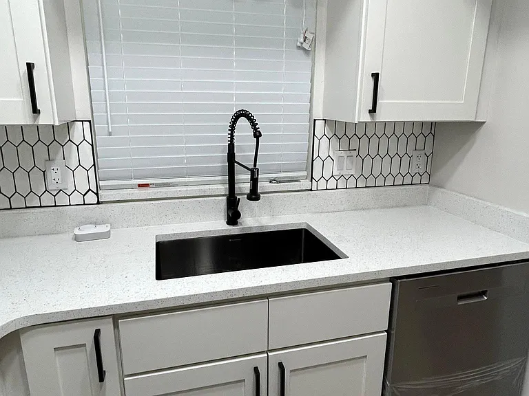 New Sink, New Pull Down Faucet, New Dishwasher, New Blinds and New Energy Efficient Window