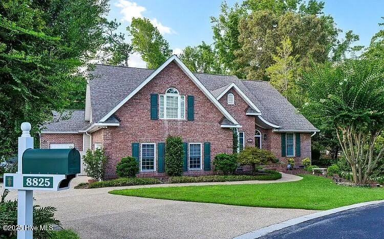 8825 Sawmill Creek Ln — Photo 1