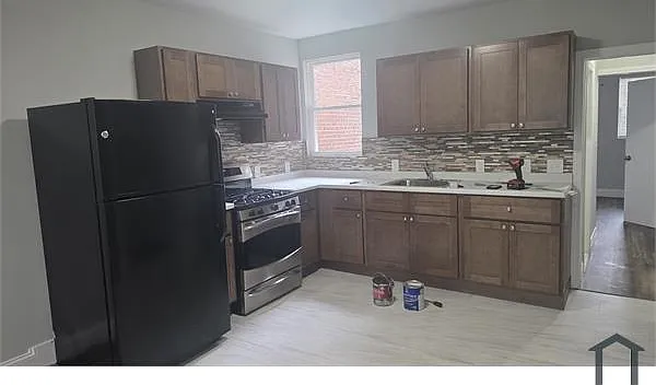 6957 Ogontz Ave — Photo 3