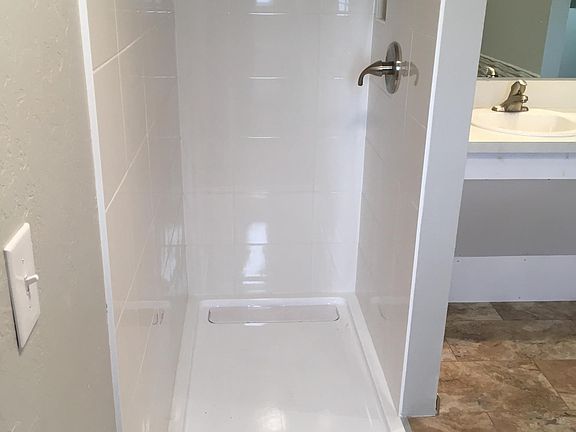Custom flush mount walk or roll in shower