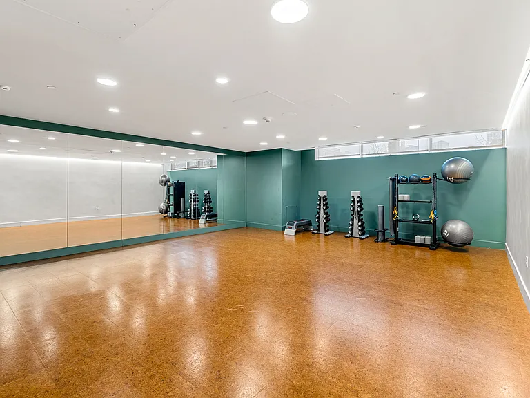 Find your flow in the serene yoga room, crafted for stretching, meditation, and low-impact training