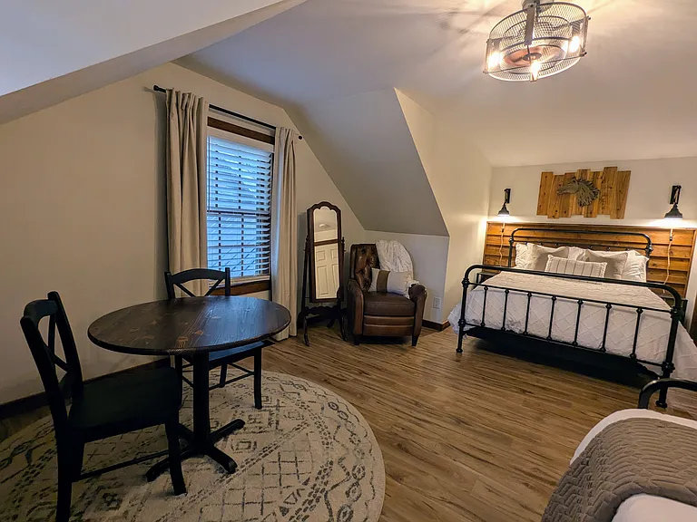 UPSTAIRS BEDROOM 2 (sleeps 4): Queen Bed with Twin Daybed and Pop Up Twin Trundle