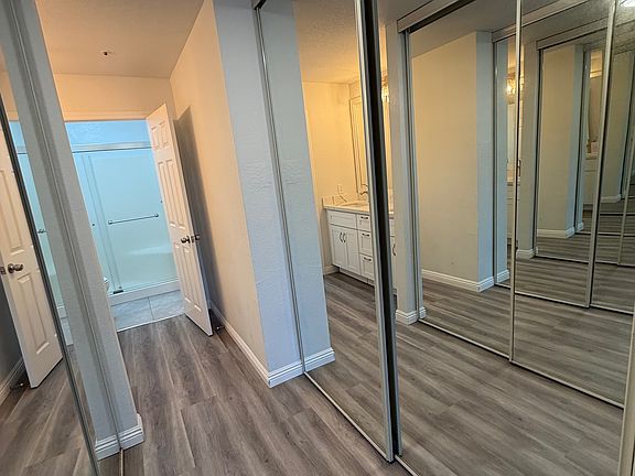 Gorgeous primary bath dual closets and sinks