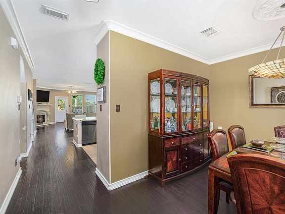 Beautiful wood flooring flows from the entry, down the hall into the family room creating a seamless look that is so easy to maintain. Fresh interior paint in 2019.
