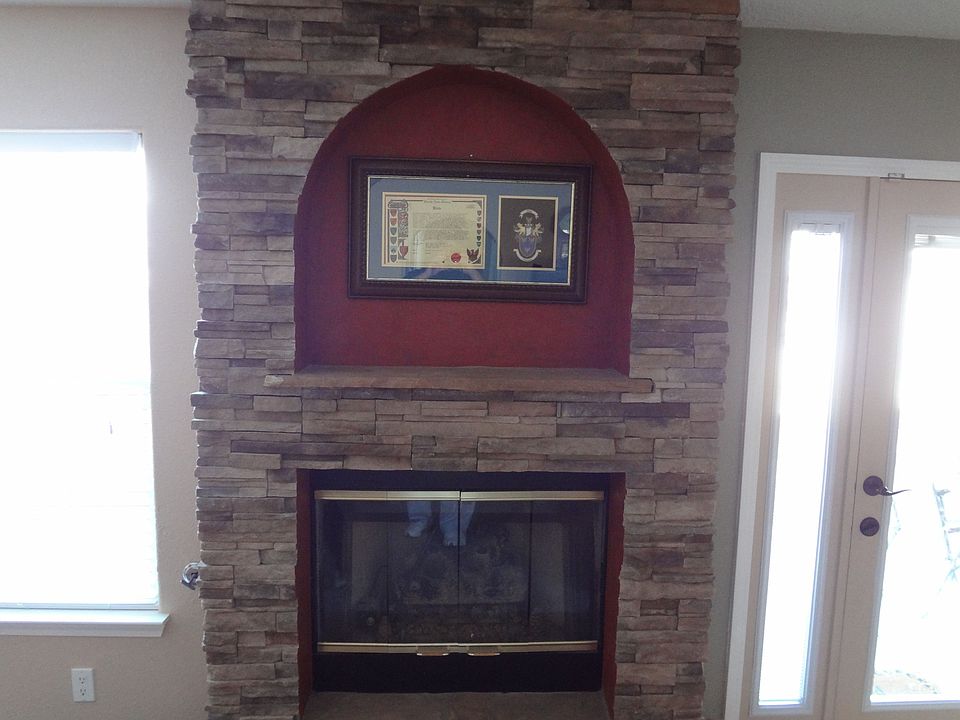Stone Fireplace w/plaster accent