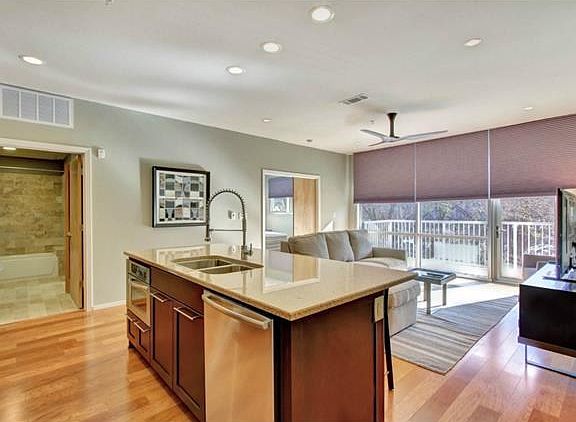 Kitchen island is home to the Bosch dishwasher and KitchenAid microwave.