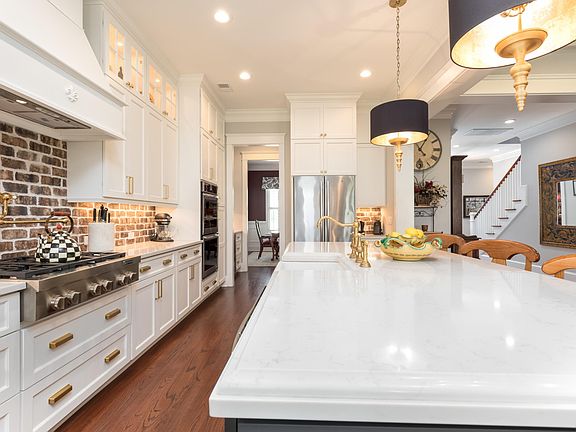 Kitchen View Into Dining & Foyer
