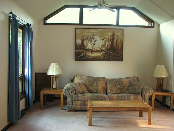 Living room with vaulted ceiling