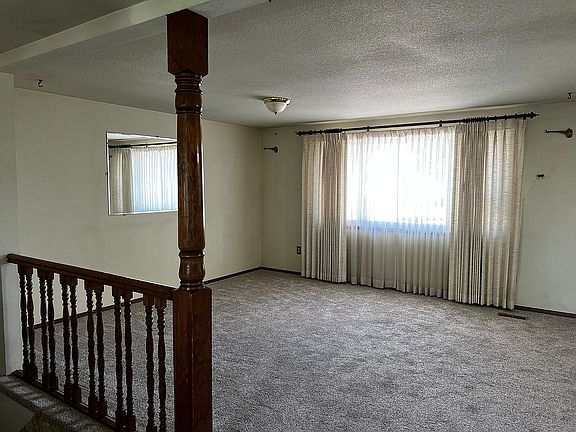 Living room, 28 ft by 13 ft