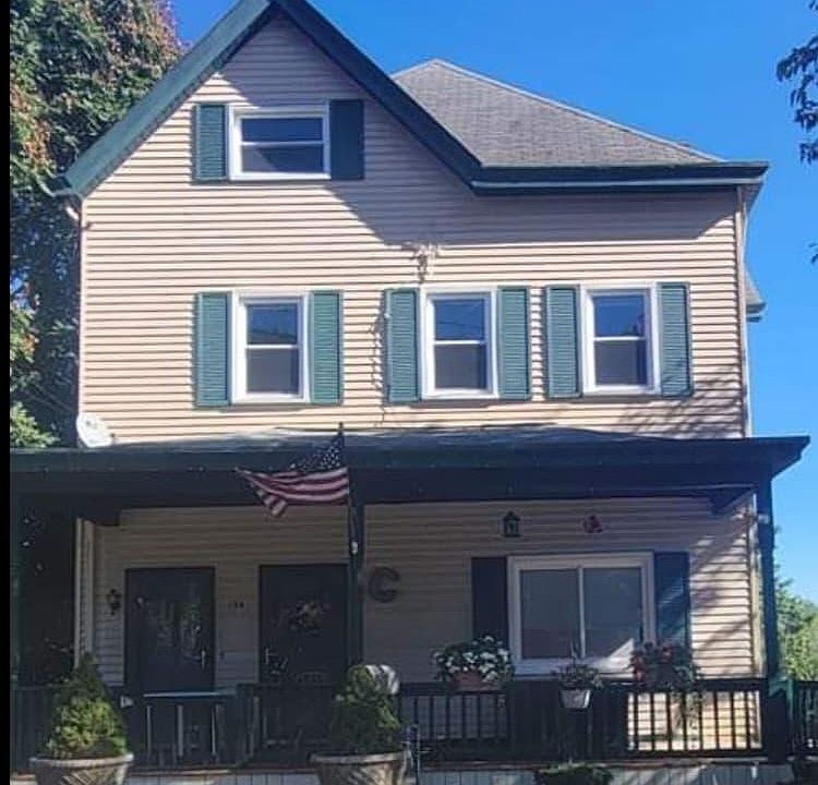 Front of the home; apartment for rent is on the first floor.