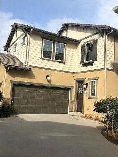 front of house, share driveway with 4 houses, two car garage