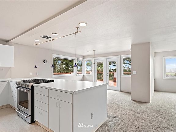 Plenty of cabinets and countertop space in the kitchen.
