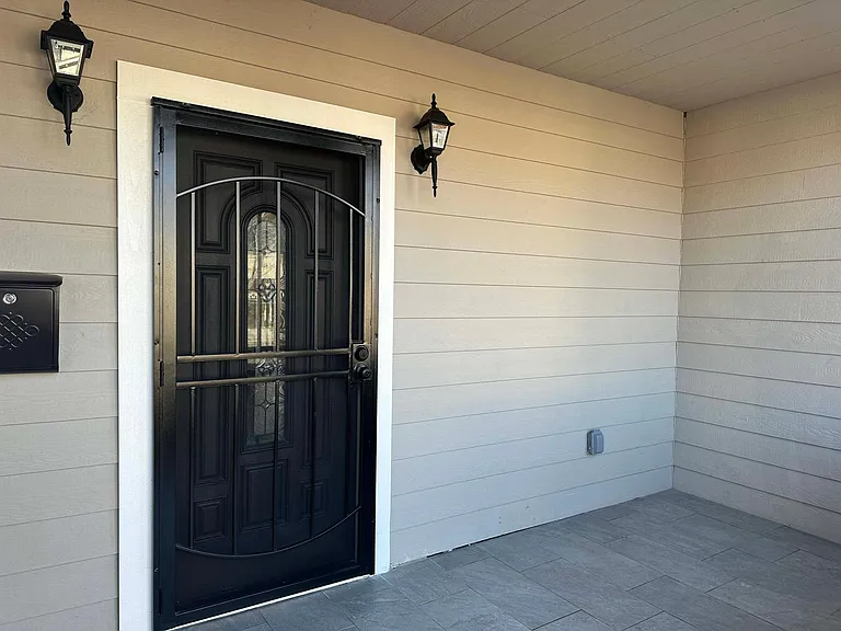 The front porch is a perfect area to sit and relax outdoors.