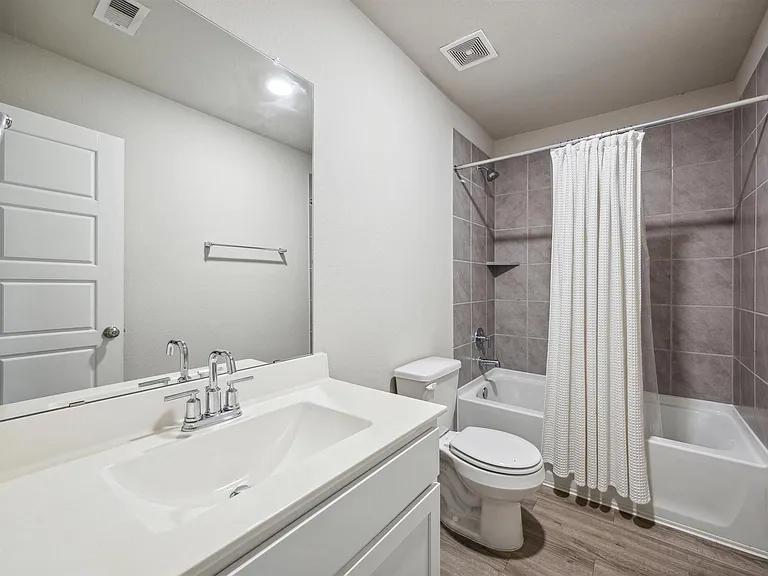 6414 Fiddlewood Thicket Ln — Photo 24