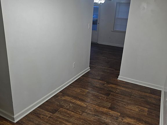 Dining area between living room and kitchen.