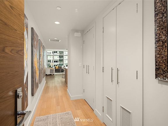 Engineered hardwood floors at the entry and throughout the main living areas.