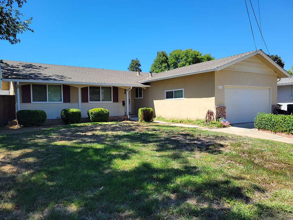 New low maintenance landscaping waiting on contractor.