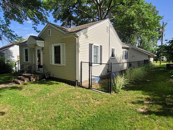 Northwest corner - shows entry gate and maiden grass provides some privacy