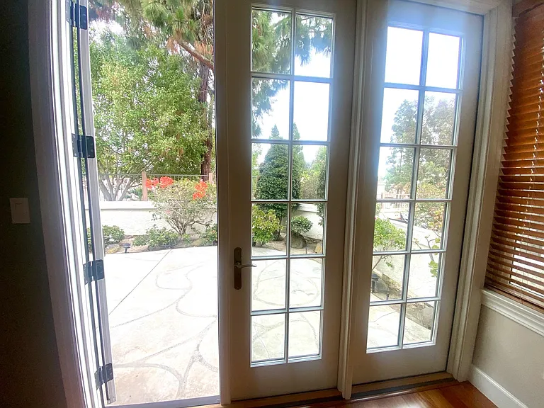 French doors opening to back patio.