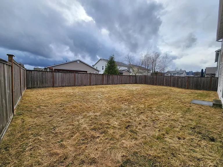 HUGE fenced back yard