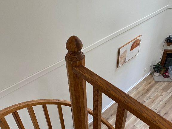 spiral steps up to second bedroom/office or loft area. with walk in closest .