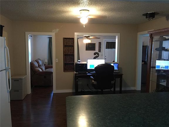 Taken from the kitchen looking to the dining room and through to the living room.