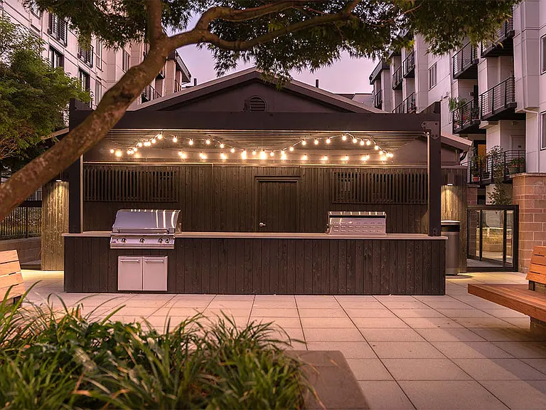 Apartment community outdoor grilling station at Griffis Lake Washington in Renton, Washington.