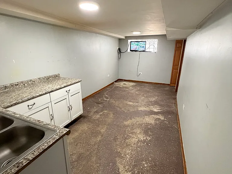 basement kitchen and living room