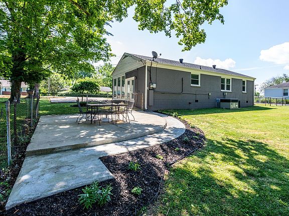 Very nice concrete patio right outside the home.
