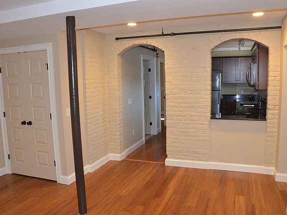 51 Allen #102 Living Room with coat closet to kitchen