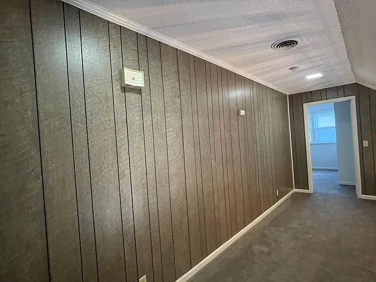 As noted earlier the stairs going to the second floor are to the right of the large kitchen/breakfast room. They are carpeted for comfort and land in this large oft area. Just use your imagination on how you would like to use this space. Another sitting