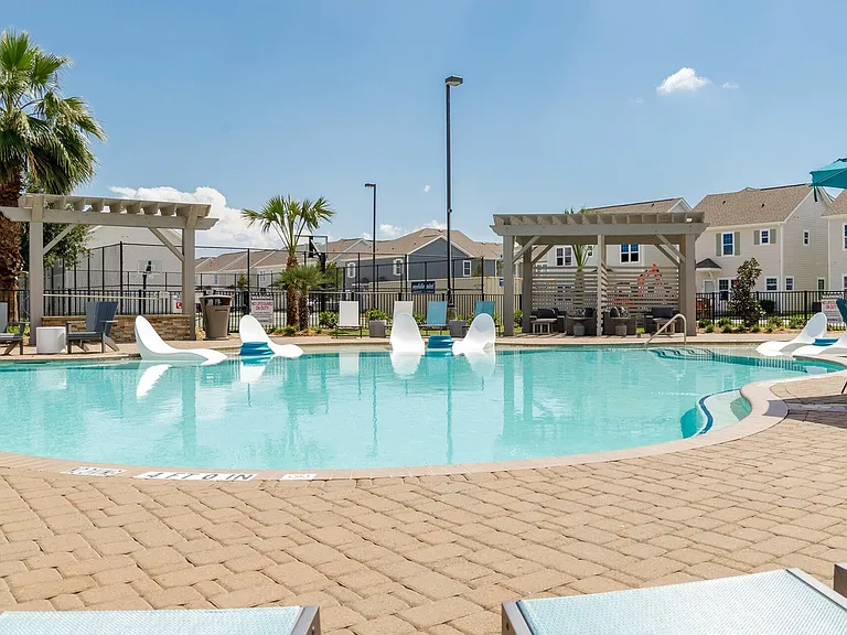 Relax and Unwind by the Resort-Style Pool at Seaglass Apartments