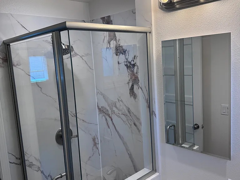 mirror storage and glass shower