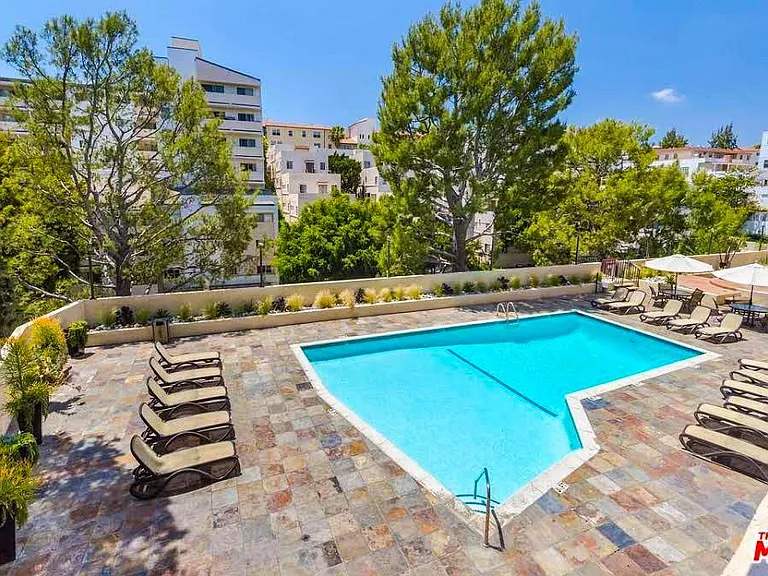 Luxurious outdoor pool for sunning and swimming