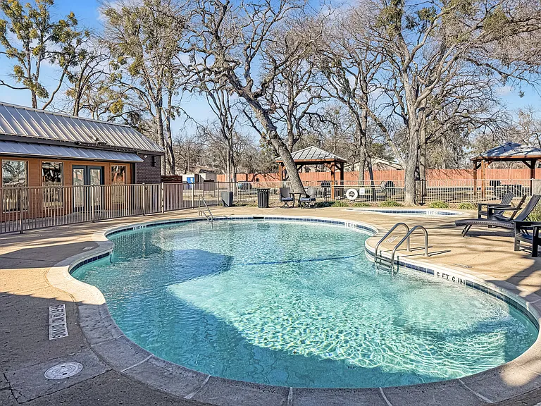 Dive into our sparkling pool and unwind under the Texas sun.