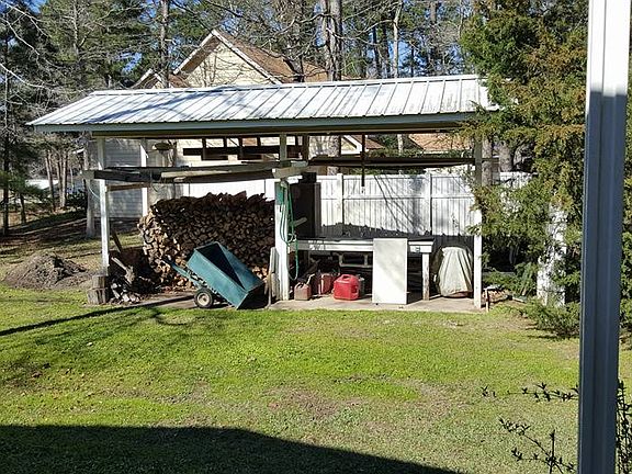 Fish cleaning and wood pile