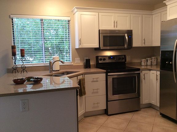 Updated Kitchen with Stainless Appliances and quartz counter
