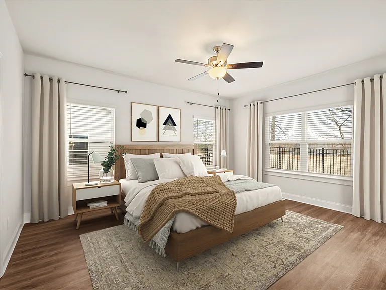 Serene primary suite with a plush king bed, refined finishes, and calming greeneryyour private retreat for rest and relaxation.