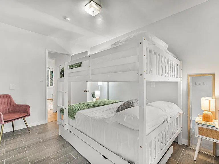 Fun and cozy _ the perfect bedroom with a bunk bed for double the comfort.
