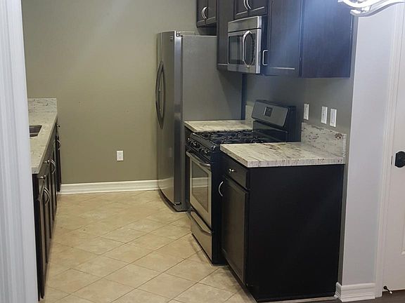 Designer Colors and Upscale Stainless Appliances including Water/Ice Refrigerator