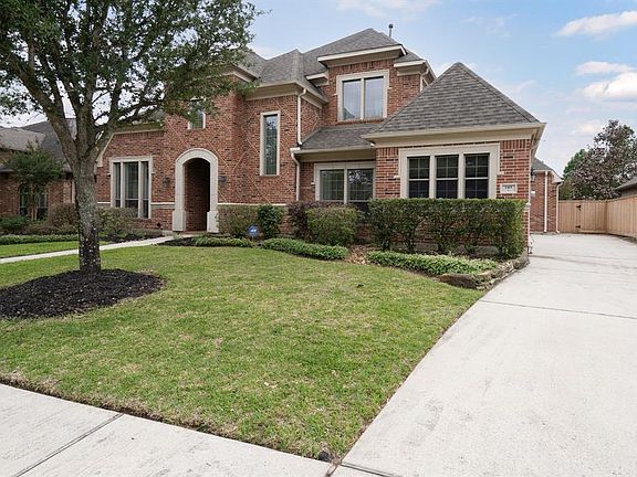 This extended driveway provides ample space for parking and leads to a 3 car garage!