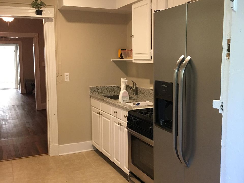 Kitchen with granite countertops and stainless steel applian