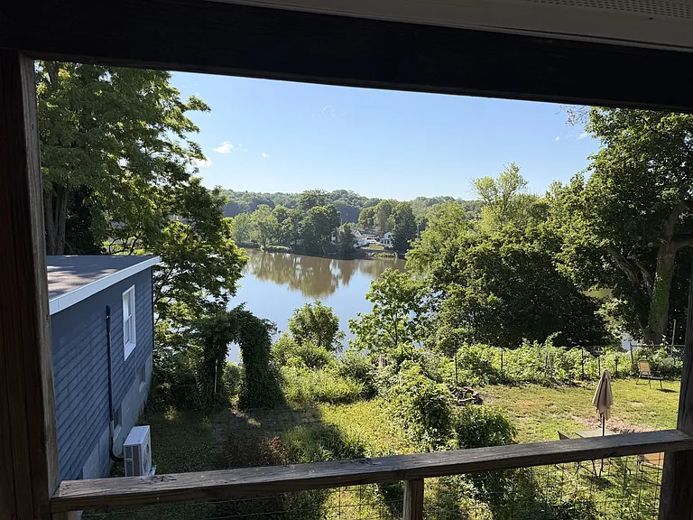 Fenced-in Back yard with view of lake exclusively for this unit's use