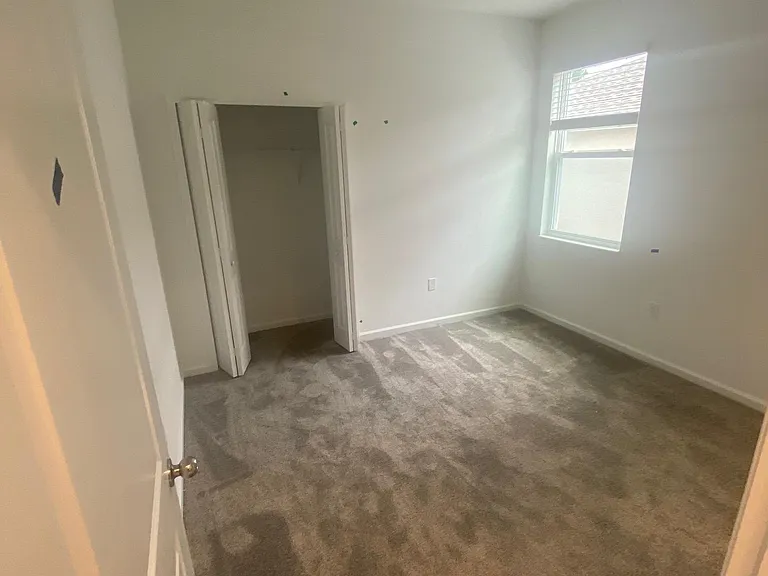 condo master bedroom with master bath