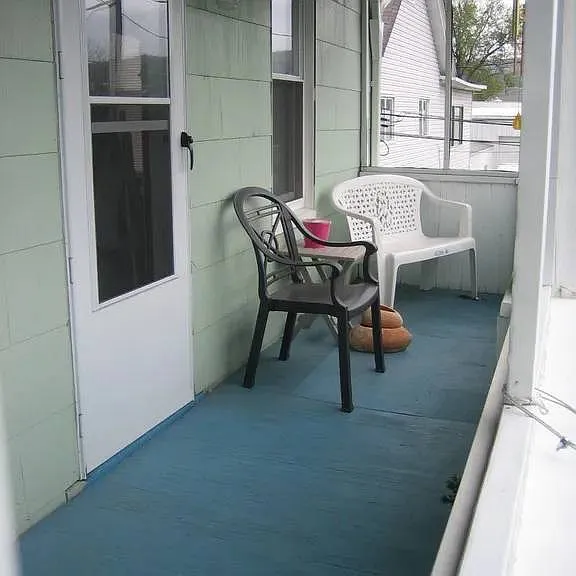 Covered Porch, Door Leads to Living Room