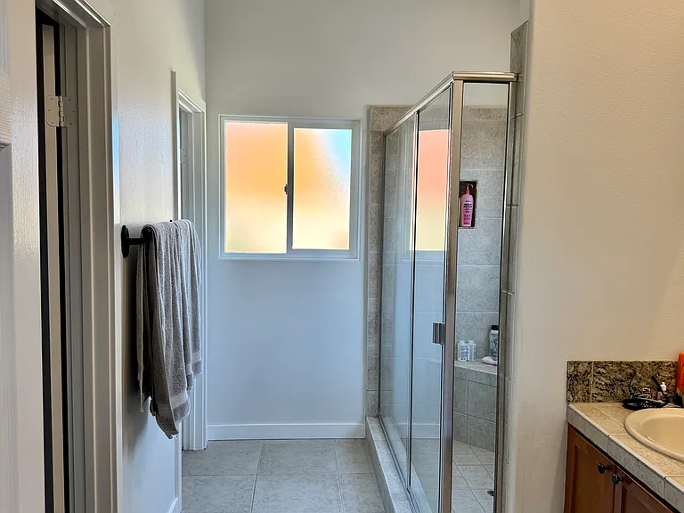 Primary bathroom with large walk in closet