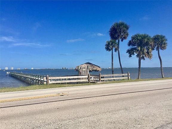 PRIVATE COMMUNITY OWNED 300' PIER/DAY DOCK WITH TIKI HUT FOR OWNERS ENJOYMENT.  HIDDEN GEM ALONG THE INDIAN RIVER.  HALF ACRES B