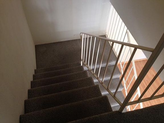 Showing Staircase w center landing